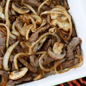 Grilled Top Sirloin Steak Cubes Sautéed in Onions